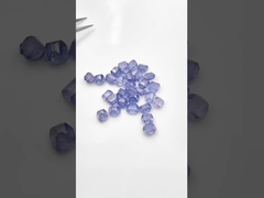 Colored rough diamonds and processed loose diamonds